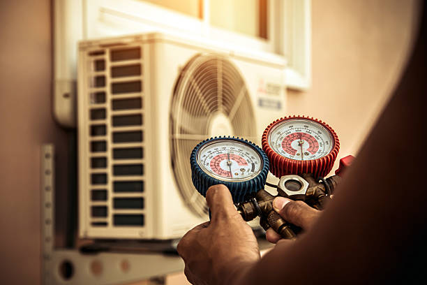 Professional Hvac technician working in Marengo, IA